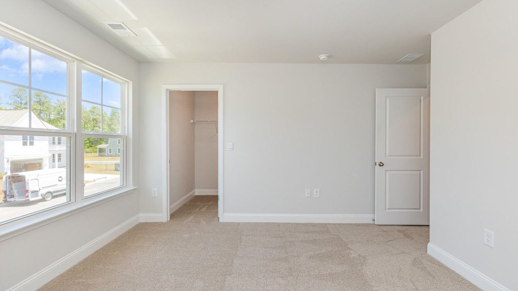 Spacious, unfurnished interior of a new home in The Ranch, Holly Hill (Image 15).
