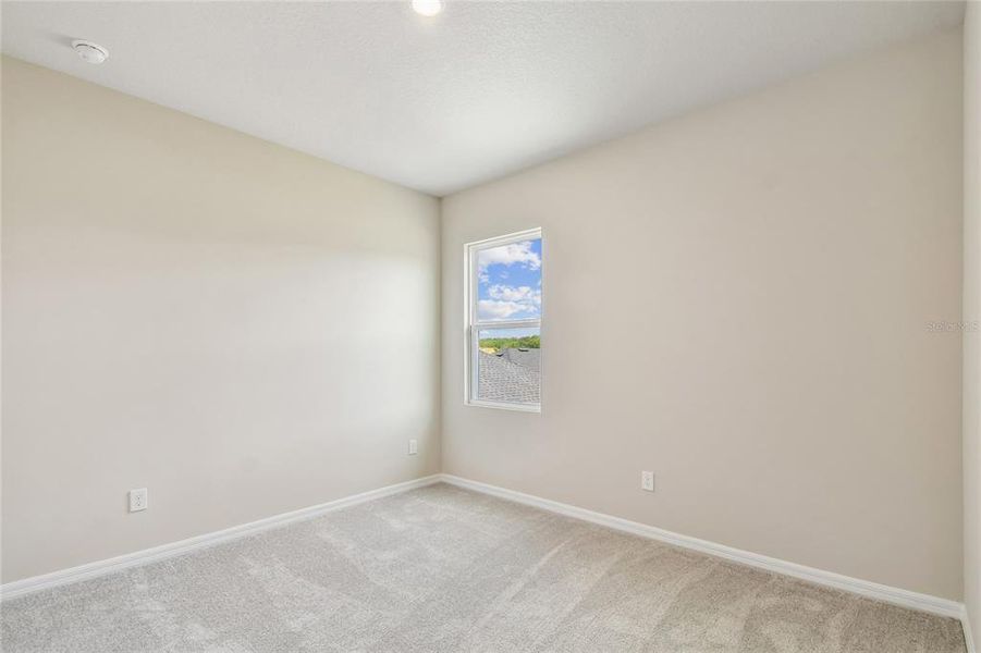 Spacious, unfurnished interior of a new home in Oakfield at Mount Dora Cottage Series, Mount Dora (Image 30).