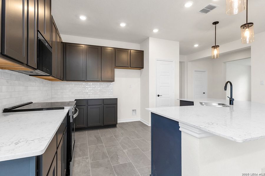 Furnished interior view inside a new home in Shoreline Park - Classic Collection, Boerne (Image 3).