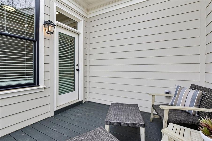 Doorway to property featuring a deck