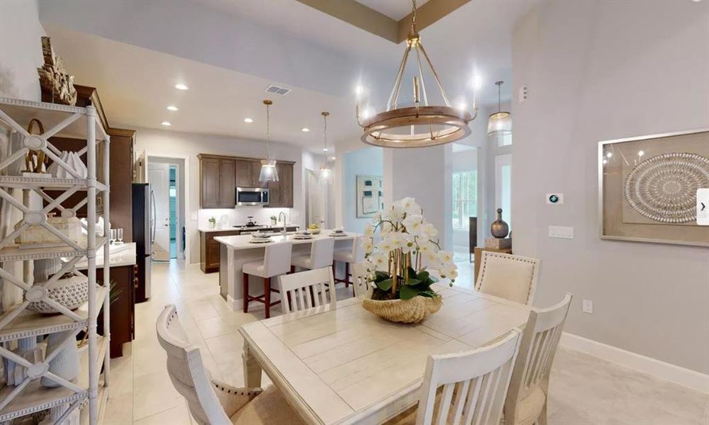 Furnished interior view inside a new home in Plantation Bay, Ormond Beach (Image 6).