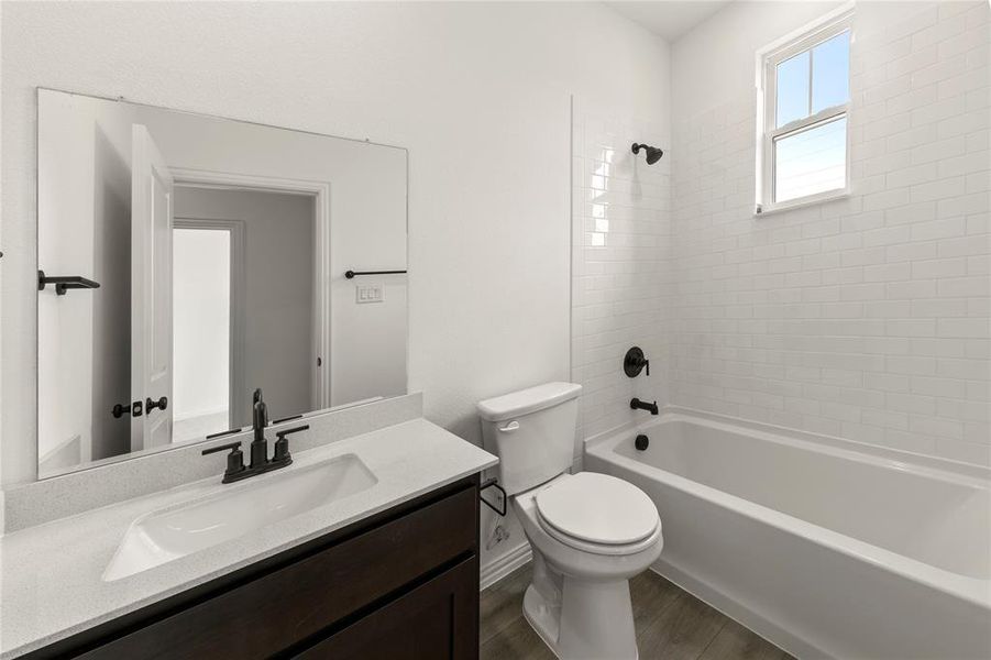 Furnished interior view inside a new home in Collin Creek, Plano (Image 4).