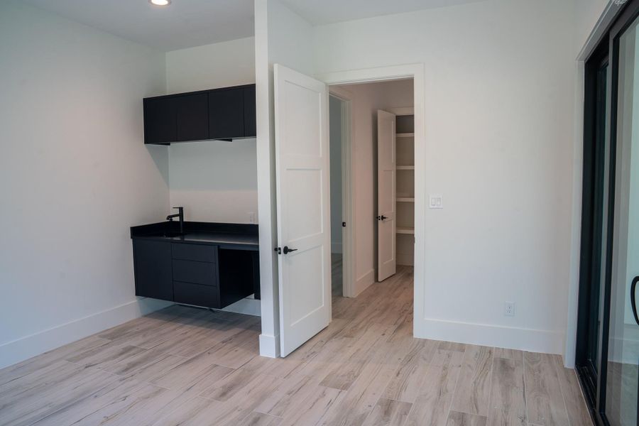Flex room equipped with sink and pre-wired for a mini-fridge for your cold beverages.