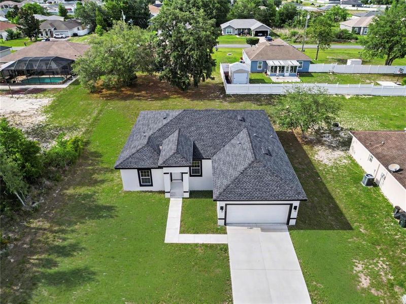 Front exterior of a new home in , Ocala, FL, highlighting curb appeal (Image 31).