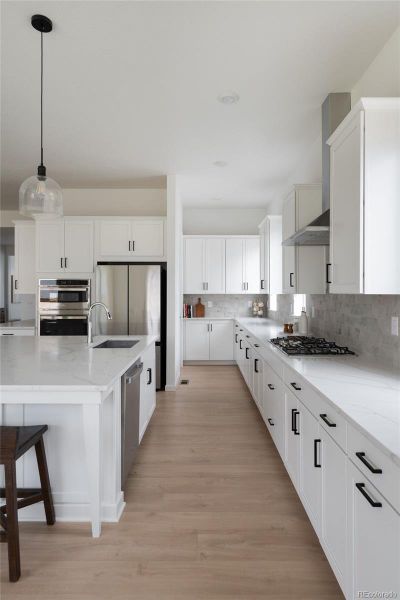 Furnished interior view inside a new home in Trailstone Destination Collection, Arvada (Image 10).