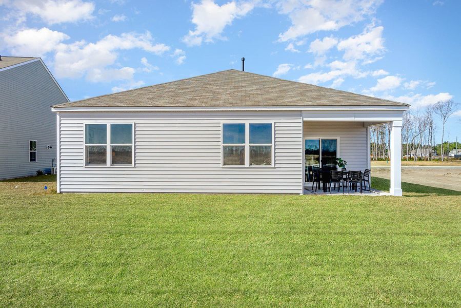 Representative exterior photo of a completed home built from the CALI by D.R. Horton in Kingston Bay, Conway, SC (Image 24).