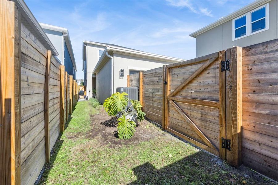 Exterior details and patio area of a home in Laureate Park at Lake Nona - Garden Series, Orlando (Image 21).