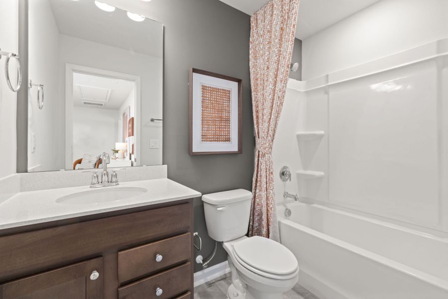 Furnished interior view inside a new home in Huxley, Apex (Image 16).