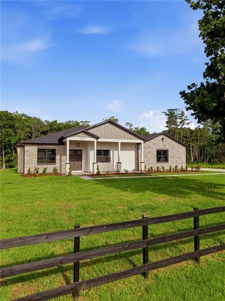 Front exterior of a new home in , St. Cloud, FL, highlighting curb appeal (Image 33).