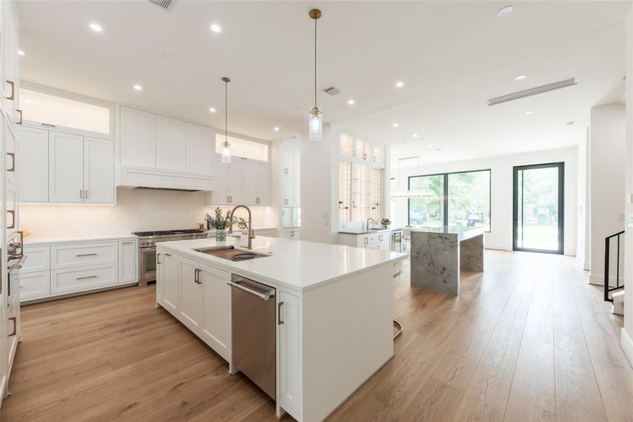 A bright kitchen with an oversized island