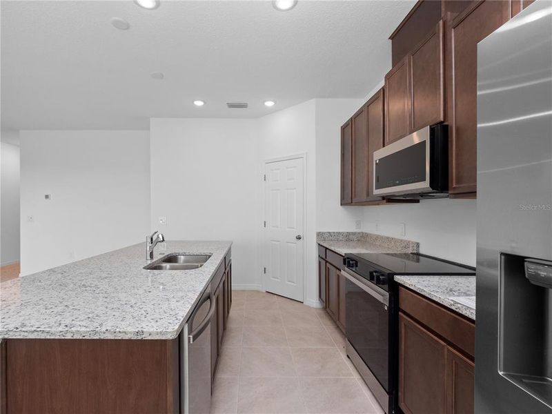 Furnished interior view inside a new home in , Haines City (Image 6). Furnished interior view inside a new home in , Haines City (Image 6).