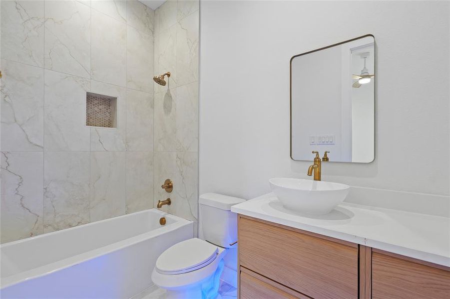 Bathroom featuring vanity and shower combination Bathroom featuring vanity and shower combination