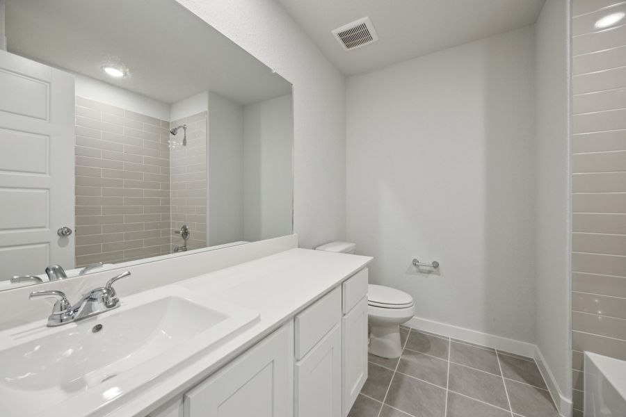 Bathroom in the Haylee home plan by Trophy Signature Homes - REPRESENTATIVE PHOTO Bathroom in the Haylee home plan by Trophy Signature Homes - REPRESENTATIVE PHOTO