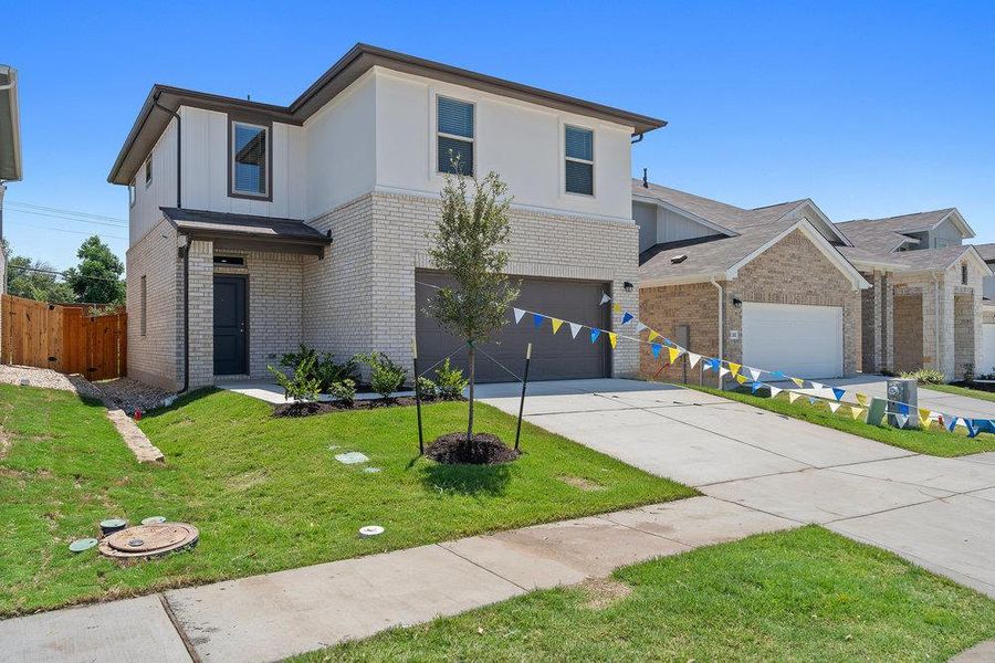 Carson L Elevation. Photo of similar home. Actual home under construction.