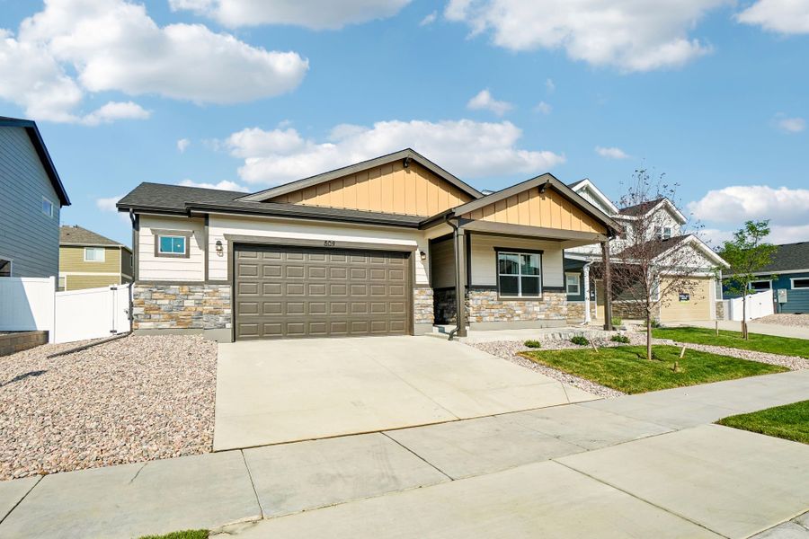 Front exterior of a new home in Union Colony West, Greeley, CO, highlighting curb appeal (Image 28).