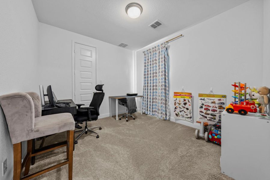 Office area with light carpet