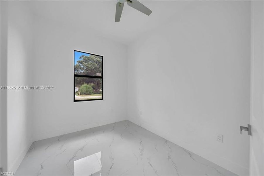 Spacious, unfurnished interior of a new home in , Lehigh Acres (Image 9).