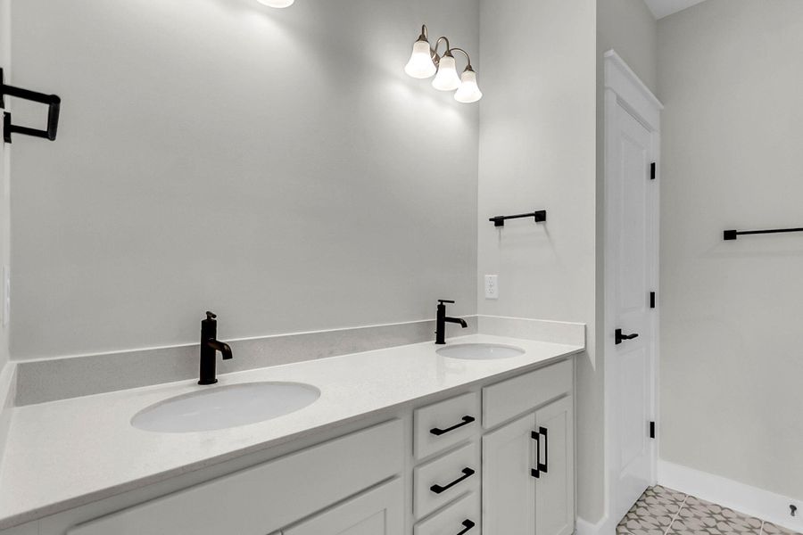 Furnished interior view inside a new home in Tidewater at Lakes of Cane Bay, Summerville (Image 36).