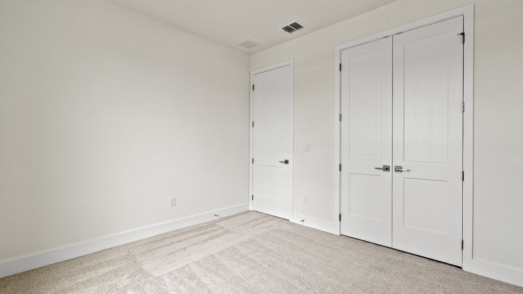 Representative unfurnished interior of a home built from the Longleaf by DRB Homes in Lakeside at Satilla, St. Cloud (Image 17).