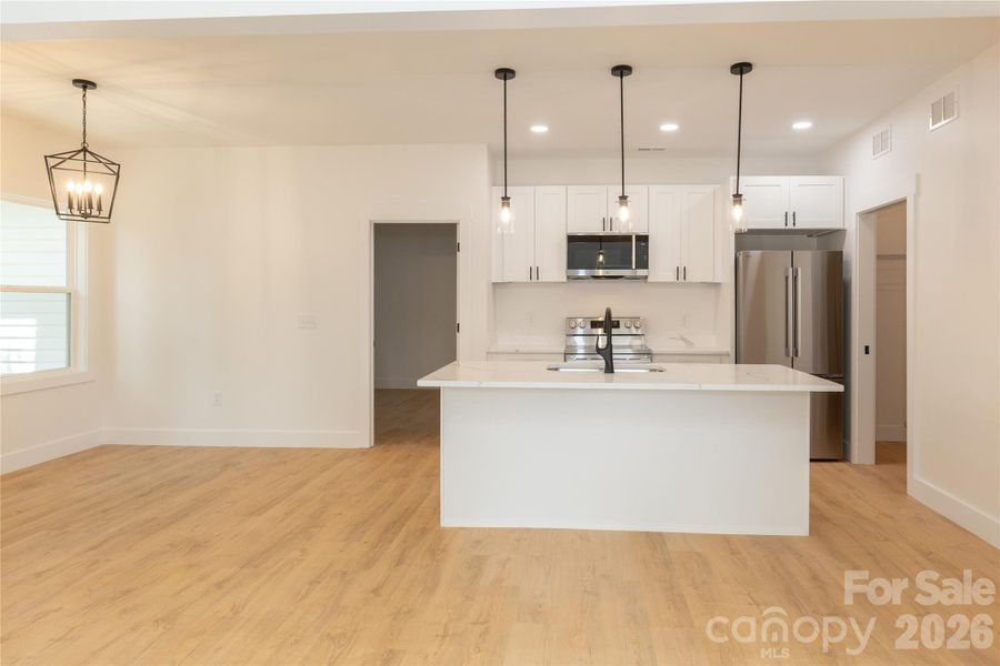 Furnished interior view inside a new home in , Concord (Image 7).