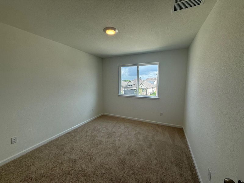Spacious, unfurnished interior of a new home in Midtown Reserve, College Station (Image 18).