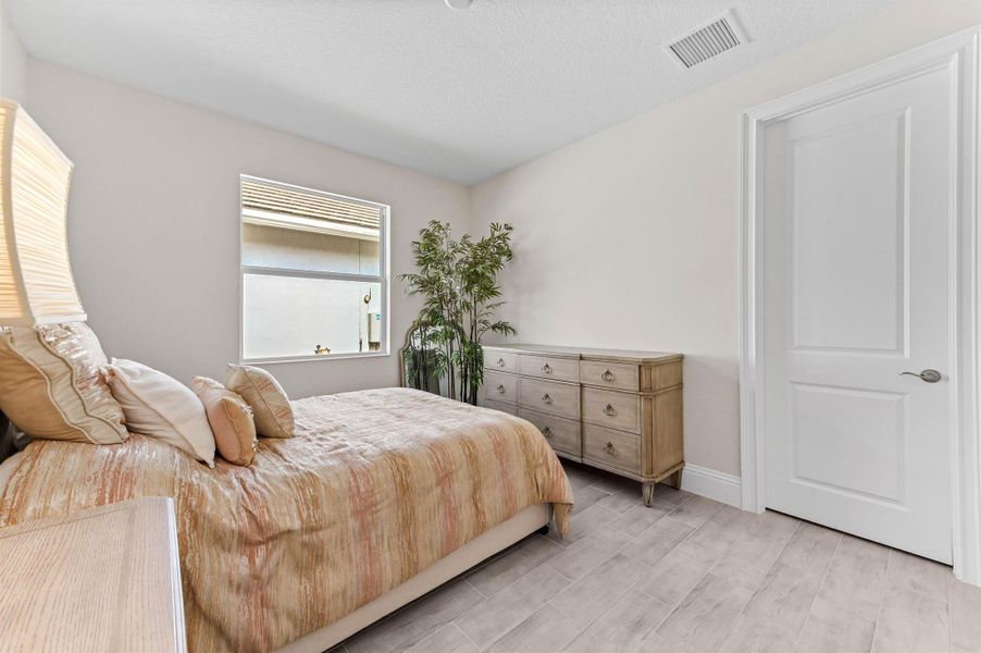 Furnished interior view inside a new home in Belterra, Port St. Lucie (Image 43).