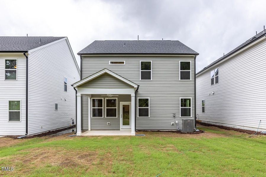 Front exterior of a new home in Gregory Village, Lillington, NC, highlighting curb appeal (Image 66).