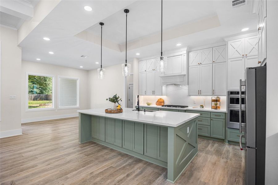 Formal Dining is Conveniently Located Off the Kitchen, Perfect for Hosting Guests with Tons of Natural Light and a Sliding Glass Door for Easy Access onto Your Extended Patio.