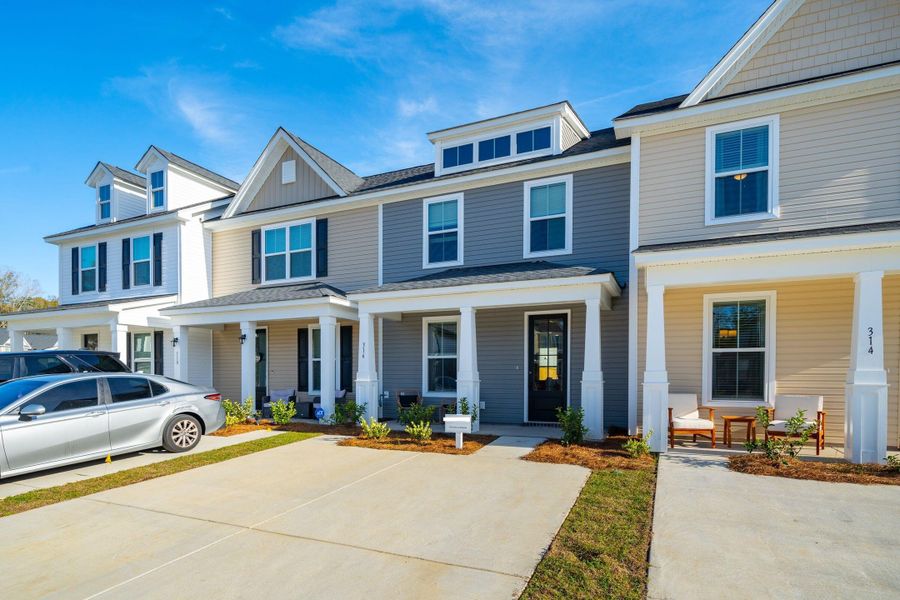 Front exterior of a new home in Abbey Walk, Moncks Corner, SC, highlighting curb appeal (Image 29). Front exterior of a new home in Abbey Walk, Moncks Corner, SC, highlighting curb appeal (Image 29).