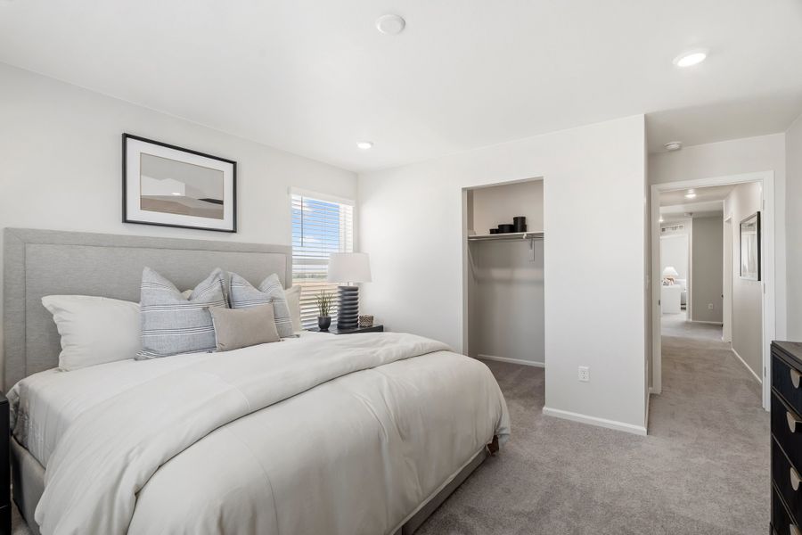 Representative furnished interior of a home built from the 2003 by Risewell Homes in Harvest Crossing, Aurora (Image 13).