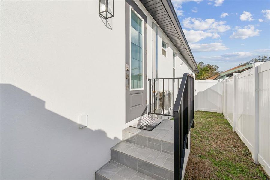 Exterior details and patio area of a home in , Tampa (Image 35).