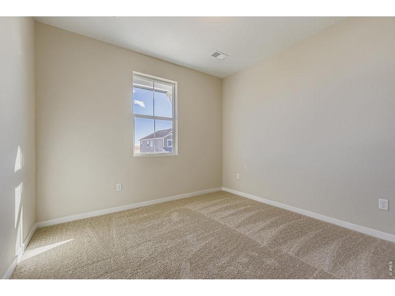 Spacious, unfurnished interior of a new home in Farmstead, Berthoud (Image 22).