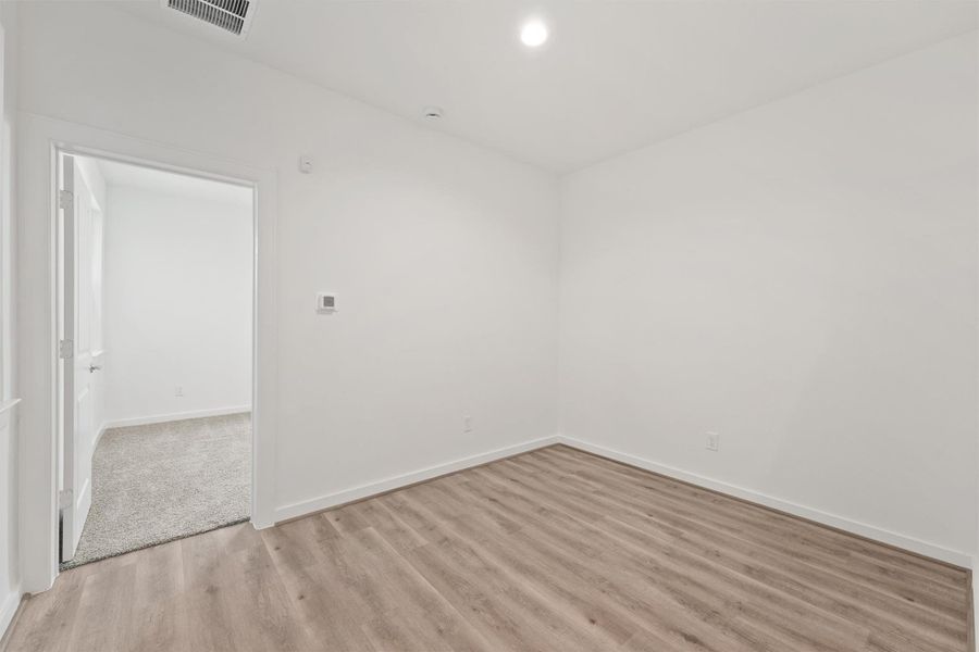 Spacious, unfurnished interior of a new home in Highland Commons, Houston (Image 13). Spacious, unfurnished interior of a new home in Highland Commons, Houston (Image 13).