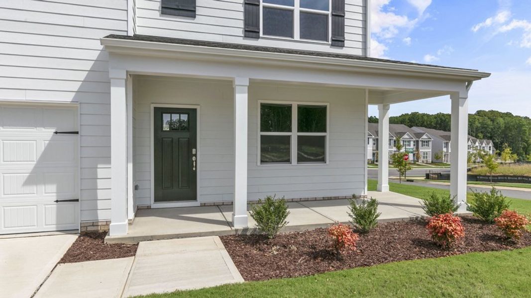 Exterior details and patio area of a home in Beaver Dam Crossing, Bailey (Image 2). Exterior details and patio area of a home in Beaver Dam Crossing, Bailey (Image 2).