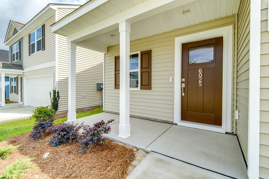 Exterior details and patio area of a home in Ellington, Elgin (Image 3).