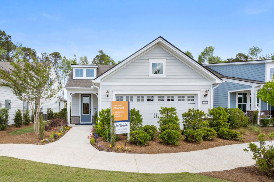 Front exterior of a new home in Del Webb Savannah at Heartwood, Richmond Hill, GA, highlighting curb appeal (Image 1). Front exterior of a new home in Del Webb Savannah at Heartwood, Richmond Hill, GA, highlighting curb appeal (Image 1).