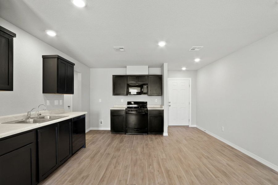 Furnished interior view inside a new home in Rancho Desierto Bello, Horizon City (Image 9).
