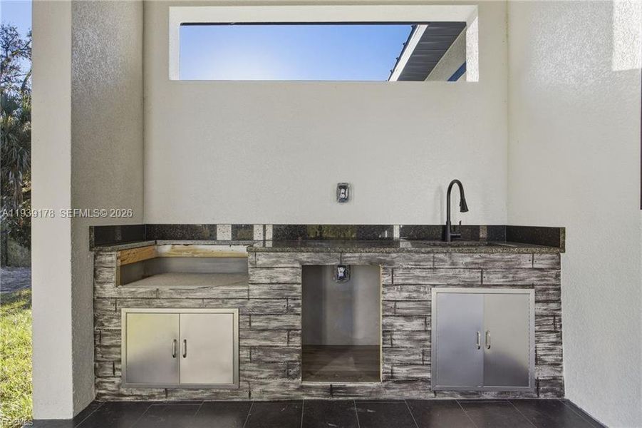 Exterior details and patio area of a home in , Labelle (Image 22).