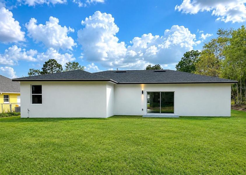 Exterior details and patio area of a home in , Ocala (Image 3).