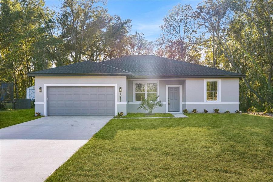 Front exterior of a new home in , Dunnellon, FL, highlighting curb appeal (Image 21). Front exterior of a new home in , Dunnellon, FL, highlighting curb appeal (Image 21).