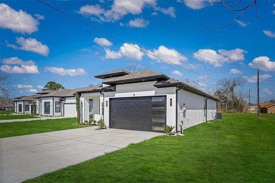 Front exterior of a new home in , Dayton, TX, highlighting curb appeal (Image 26).