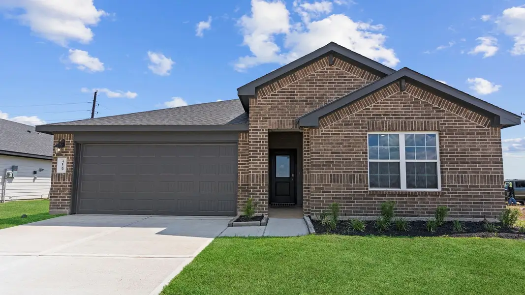 Front exterior of a new home in Evergreen, Rosenberg, TX, highlighting curb appeal (Image 1). Front exterior of a new home in Evergreen, Rosenberg, TX, highlighting curb appeal (Image 1).