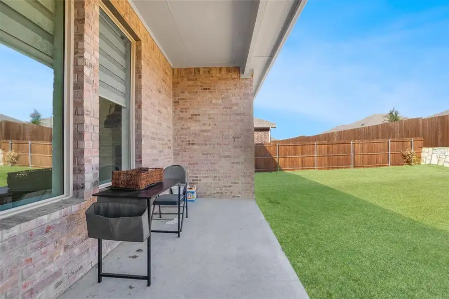 Exterior details and patio area of a home in Northlake Estates, Little Elm (Image 4). Exterior details and patio area of a home in Northlake Estates, Little Elm (Image 4).