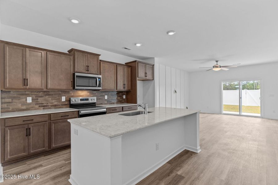 Furnished interior view inside a new home in Coastal Haven Townes, Leland (Image 6).