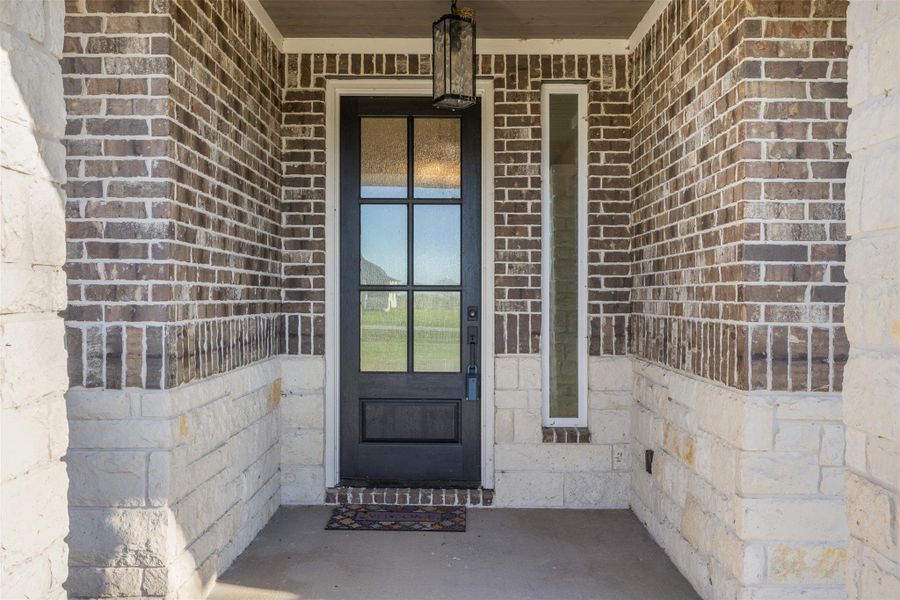 Exterior details and patio area of a home in , Iola (Image 3).
