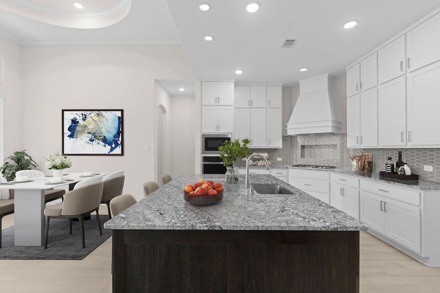 Expansive kitchen layout featuring quartz countertops, sleek tile backsplash, and abundant custom cabinetry for all your storage needs. *Virtually Staged*