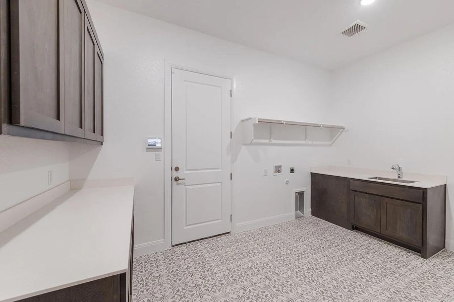 Furnished interior view inside a new home in Wolf Ranch West Bend - 60', Georgetown (Image 5).