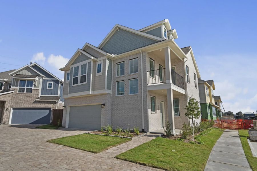 Representative exterior photo of a completed home built from the Riverdale by Chesmar Homes in Meridiana Courtyard Collection, Manvel, TX (Image 24).