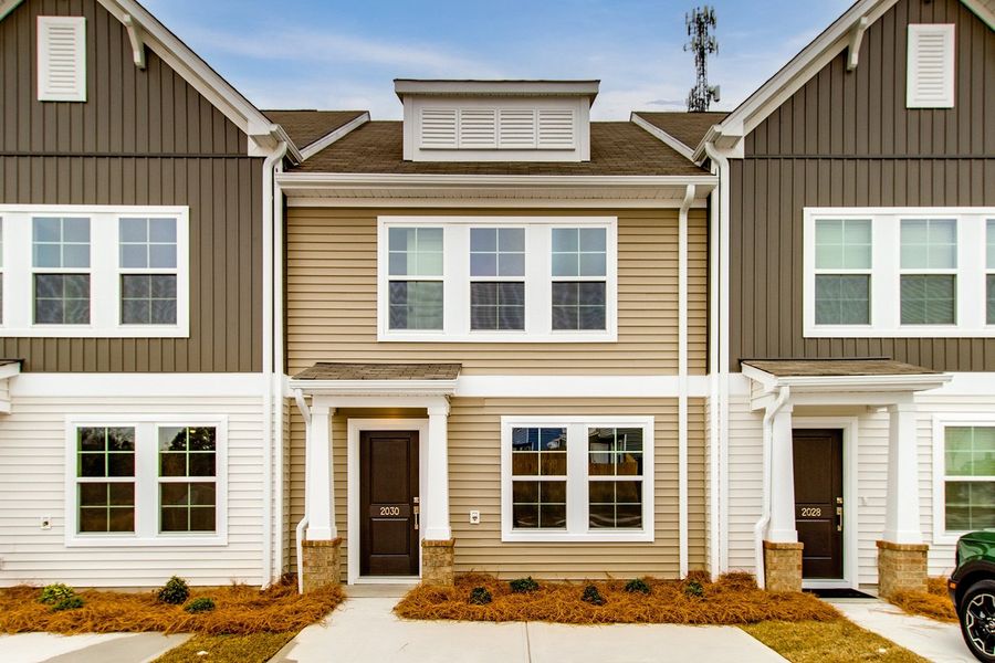 Front exterior of a new home in Astoria, Columbia, SC, highlighting curb appeal (Image 1). Front exterior of a new home in Astoria, Columbia, SC, highlighting curb appeal (Image 1).