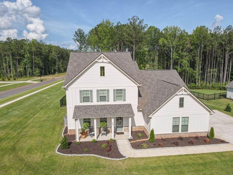 Front exterior of a new home in , Senoia, GA, highlighting curb appeal (Image 40). Front exterior of a new home in , Senoia, GA, highlighting curb appeal (Image 40).